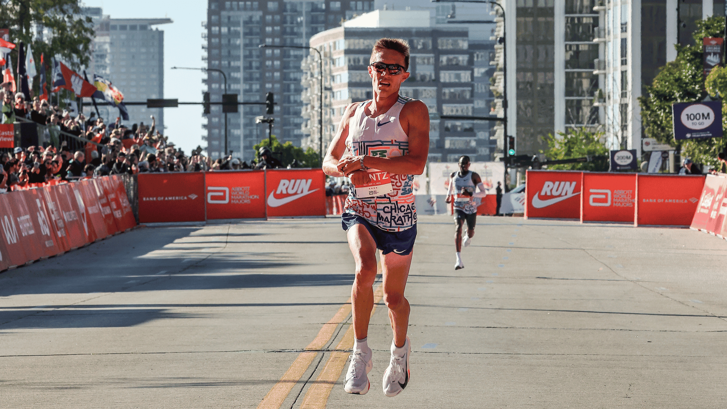 Conner Mantz of the USA at finish line of the 2025 Chicago Marathon, celebrating after breaking the 23-year record
